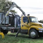 Dump Bed with Log Grasp Arm