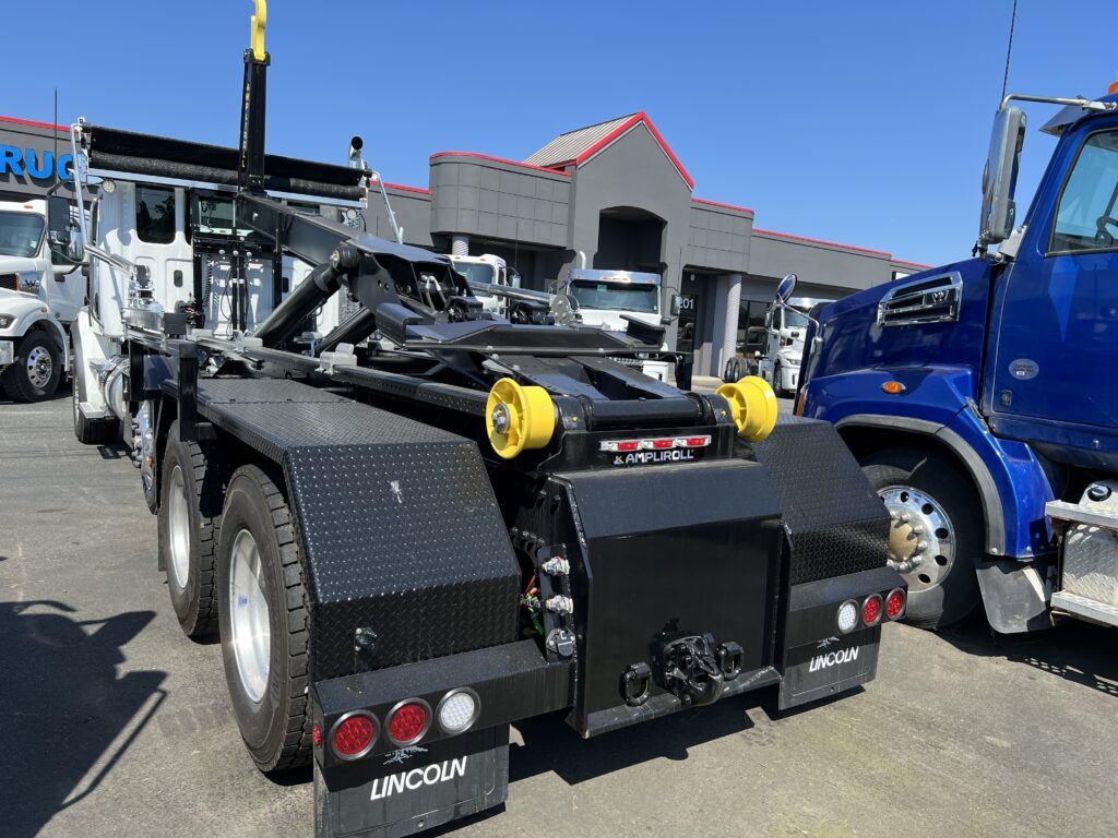 A high pressure Ampliroll hooklift system